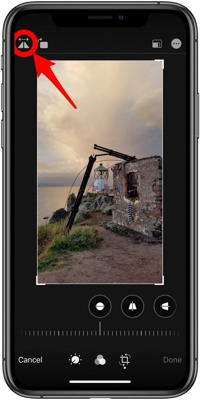 the crop-rotate screen in the Photos app with the Mirror icon highlighted